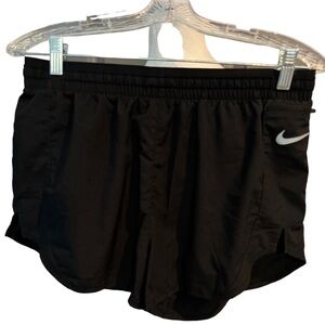 Nike woman’s shorts NWOT black gray Nike symbol